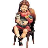Sitting girl with cat and chair