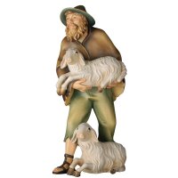 Hirt mit Schaf auf Arm