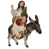 Jesus sitting with donkey