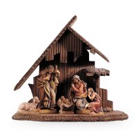 Holy Family with child, sheep and stable