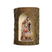 Holy Night crib in a tree trunk