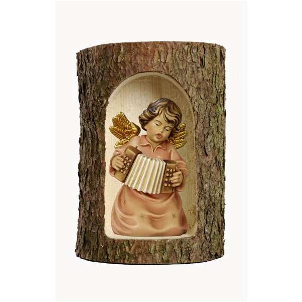 Bell angel with accordion in a tree trunk