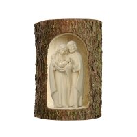 Group Holy Family Pema in a tree trunk