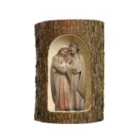 Group Holy Family Pema in a tree trunk