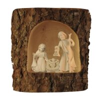 Holy Family in a tree trunk