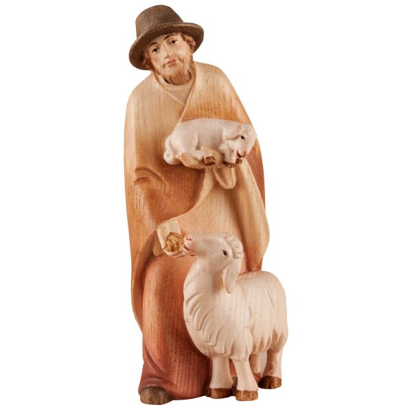 Shepherd with salt sheep and lamb