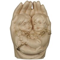 Protective hands with girl and boy