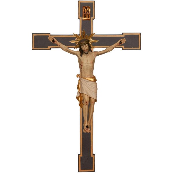 Crocifisso classico con aureola su croce romanica