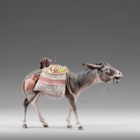 Donkey going with bags