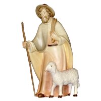 Hirt mit Hut und Schaf stehend